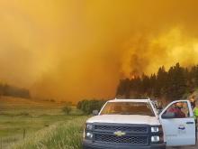 Firefighting personnel battle wildfires across British Columbia. Photo supplied by Flickr/Government of B.C.