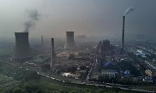 A state-owned coal-fired power plant i in Huainan, Anhui province, China. Photograph: Kevin Frayer/Getty Images