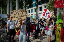Protesters march in Miami ahead of Gov. Ron DeSantis’ presidential campaign launch last May. JASON KOERNER/GETTY IMAGES FOR DNC