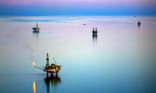 Oil rigs in the Cook Inlet oil field of Alaska. ‘Doubling down on fossil fuels is a false solution that only perpetuates the problem.’ Photograph: PA Lawrence/Alamy