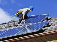 Installing solar panels - Greens MPs/Flickr