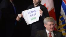 Climate change activists disrupt Harper event
