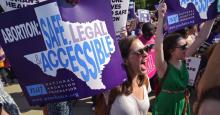 Reproductive rights activists hold placards and chant outside of the U.S. Supreme Court ahead of a ruling on abortion clinic restrictions on June 27, 2016 in Washington, D.C. (Photo: Mandel Ngan/AFP via Getty Images)