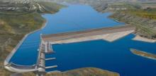 Artist rendering of B.C. Hydro's Site C dam, which would flood sacred Treaty 8 lands in the Peace River Valley in British Columbia.