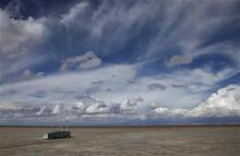 In this Jan. 12, 2016 photo, an abandoned boat lies on the dried up lake bed of Lake Poopo, on the... Read mor