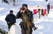 Photojournalist Amber Bracken documenting the police raid at the Unist’ot’en Healing Centre on Feb. 10, 2020. Bracken and documentary filmmaker Michael Toledano were arrested at another camp kilometres from the healing centre on Friday. Photo by Amanda Follett Hosgood.