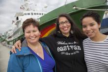 Candace Campo, Audrey Siegl and Taylor George Hollis in front of the Greenpeace vessel Esperanza that was docked in North Vancouver on Friday. Photo by Mychaylo Prystupa.