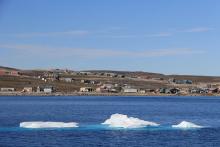 In the hamlet of 1,100 people nestled below the mountains in Clyde River, residents have been fighting seismic blasting in their hunting grounds of Baffin Bay. (Photo: Chris Williams)