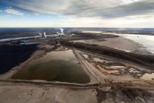 A new report confirms what communities close to the Alberta oilsands have long suspected: tailings ponds are leaking and toxic fluids are making their way into groundwater and tributaries of the Athabasca River. Photo: Todd Korol / Cavan Images