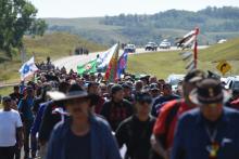 Protesters march to a construction site for the Dakota Access pipeline. Photo: Robyn Beck/AFP/Getty Images