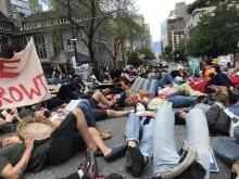 Activists stage a “die-in” to protest old-growth logging in Vancouver. Photo: Pa-to-ri-ku.