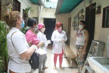 Venezuelan doctors conducting a COVID-19 house visit. Photo courtesy of @OrlenysOV