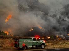 Wildfire smoke is expected to kill as many as 1.4 million people globally each year by the end of the century if planet-heating emissions are not curbed. A fire engine (343) stopped next to the large Gifford Fire on August 7, 2025. Photo by Los Padres National Forest-US Forest Service/Wikimedia Commons (CC BY 4.0)