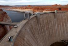 PAGE, ARIZONA - MARCH 27: A view of the Glen Canyon Dam at Lake Powell on March 27, 2022 in Page, Arizona. As severe drought grips parts of the Western United States, water levels at Lake Powell dropped to their lowest level since the lake was created by the damming the Colorado River in 1963. Lake Powell is currently at 25 percent of capacity, a historic low, and has also lost at least 7 percent of its total capacity. The Colorado River Basin connects Lake Powell and Lake Mead and supplies water to 40 mill
