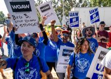 Members of the Writers Guild of America join striking autoworkers at a rally on September 26, 2023, in Ontario, California. (Gina Ferazzi / Los Angeles Times via Getty Images)
