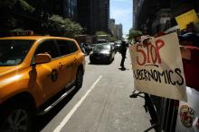 New York City drivers rally against Uber in 2015. SPENCER PLATT/ GETTY IMAGES