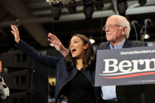 Rep. Alexandria Ocasio-Cortez and Sen. Bernie Sanders wave to his supporters at a rally at the University of New Hampshire in Durham, New Hampshire, on February 10, 2020.SAUL LOEB / AFP VIA GETTY IMAGES