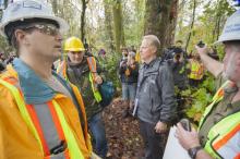 Kinder Morgan officials clash with protesters in the Burnaby Mountain conservation forest in October 2014. Photo by Mychaylo Prystupa.