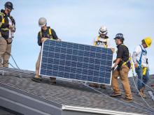 Members of Louis Bull Tribe and Iron & Earth collaborate on a solar installation project - Green Energy Futures/DSF