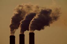 smoke stacks - The court’s decision to take the case came after a federal appeals court struck down the Trump administration’s plan to relax restrictions on greenhouse gas emissions from power plants. Credit...Charlie Riedel/Associated Press