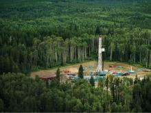Extraction at a huge cost: a drilling pad in the Montney basin. Photo via Canadian Energy Centre.