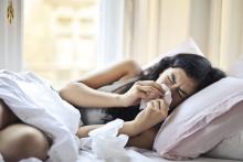Woman sick in bed.  Photo via Andrea Piacquadio on Pexels. 