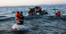 A group of Syrian refugees arrives on the island of Lesbos after traveling in an inflatable raft from Turkey near Skala Sikaminias, Greece on July 15, 2015. (Photo: UNHCR/Andrew McConnell)