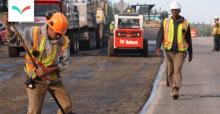 Photo: Crews work on highway resurfacing in B.C., 2019. (B.C. Department of Transportation / Flickr)