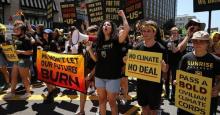 Hundreds of young climate activists marched to the White House to demand a meeting with U.S. President Joe Biden about infrastructure legislation and to reiterate their message, "No Climate, No Deal." (Photo: Chip Somodevilla/Getty Images)
