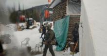 Militarized police move in to breach a tiny house at Coyote Camp in Gidimt'en territory near Houston, B.C., on Friday, Nov. 19, 2021. Photo: Amber Bracken / The Narwhal