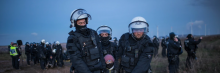Police officers detain a climate activist at a demonstration against the expansion of the Garzweiler coal mine near the village of Luetzerath on January 17, 2023 in Erkelenz, Germany. Swedish climate activist Greta Thunberg was one of these demonstrators.They were all held by police for hours before they had to go through identity check and were put in a bus. (Photo by Hesham Elsherif/Getty Images)