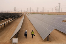 Engineers walk next to solar panels at Benban Solar Park in Aswan, Egypt, on Oct. 19, 2022. (AP Photo/Amr Nabil, File)