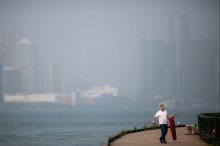 Air quality in Windsor, Ont., was among the worst in the world in late June, as wildfires raged in northeastern Canada and Quebec. Here, the Detroit skyline is barely visible through smoke and haze on June 29. (Dax Melmer/CBC)