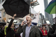 Mike Layton, Toronto city councillor for University-Rosedale, speaks to protesters during a demonstration declaring a climate crisis on June 10, 2019. Photo by Nick Iwanyshyn / Canada's National Observer