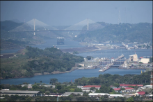 A cargo ship waits near the Centennial Bridge for transit through the Panama Canal locks, in Panama City, on Wednesday, Jan. 17, 2024. (AP Photo/Agustin Herrera)