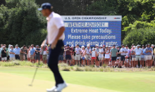 A leaderboard announces extreme heat in the area during the third round of the 124th US Open in Pinehurst, North Carolina, on Saturday. Photograph: Gregory Shamus/Getty Images