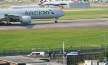 Police officers carrying out arrests at Heathrow airport perimeter on Wednesday. Photograph: Anadolu/Getty Images