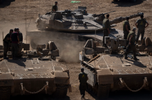 Israeli military vehicles in the northern part of the country, on September 30th.Photograph by Leo Correa / AP