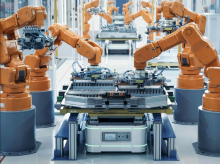 An automated production line uses robots to manufacture electric vehicle parts. EVs were built in response to climate change, but these and other technologies carry hidden costs, writes Vancouver journalist Vince Beiser. Photo via Shutterstock.