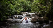 Juostin Antun goes fishing by hand while wearing traditional Shuar clothing. All photos by Ian Willms