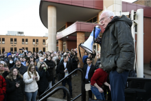 Sen. Bernie Sanders, I-Vt.,right, speaks to an overflow crowd outside Lincoln Highschool as he talks about "Fighting Oligarchy: Where Do We Go From Here"   Saturday March 8, 2025 in Warren, Mich. (AP Photo/Jose Juarez)