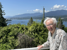 David Huntley on his home patio overlooking Burrard Inlet, where Aframax tankers pass by almost every day to load up on bitumen from the Trans Mountain pipeline's terminus at Westridge Marine Terminal, just out of sight below the treeline. Photo by Arno Kopecky/Canada's National Observer