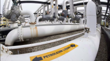 Trans Mountain is moving quicker to increase the amount of oil its pipeline system can transport from Alberta to British Columbia's coast. (Jonathan Hayward/The Canadian Press)
