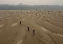Residents transport drinking water from Humaita to the Paraizinho community, along the dry Madeira River, a tributary of the Amazon River, during the dry season, Amazonas state, Brazil, in September, 2024. Edmar Barros/The Associated Press