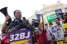 Jaime Contreras, Executive Vice President of SEIU labor union 32BJ, speaks during an immigrant rights protest outside of the Department of Justice headquarters in Washington, D.C. on June 9, 2025. ,BRYAN DOZIER/Middle East Images/AFP via Getty Images