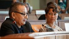 Grand Chief Stewart Phillip, flanked by Vancouver-Mount Pleasant MLA Melanie Mark, presents against the Trans Mountain expansion during a panel consultation in Vancouver, B.C. on Thurs. Aug. 18, 2016. Photo by Elizabeth McSheffrey.