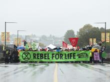 The protest group Extinction Rebellion closed the Burrard Bridge Monday morning to vehicle traffic and planned to be there all day. Photo Dan Toulgoet
