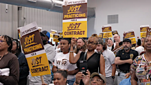 UPS workers with signs - Just Contract