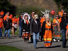 The National Day for Truth and Reconciliation memorial walk took place in Kamloops days after a white supremacist group unfurled a ‘Got bones?’ banner nearby. Photo by Darryl Dyck, the Canadian Press.