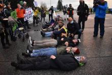 Extinction Rebellion Vancouver demonstrators blocked access to the airport on October 25 by lying down on Grant McConachie Way. EXTINCTION REBELLION VANCOUVER